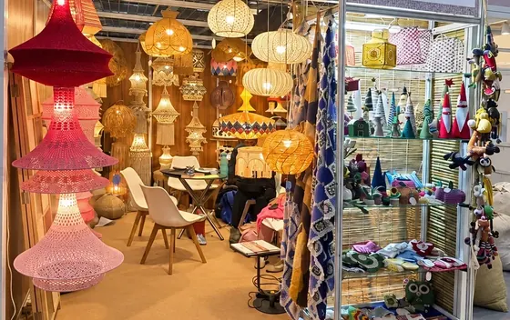 The Vera Verve stall in Hall 3 at IHGF Delhi Fair Spring 2026, with red and pink crochet lamps at the entrance.